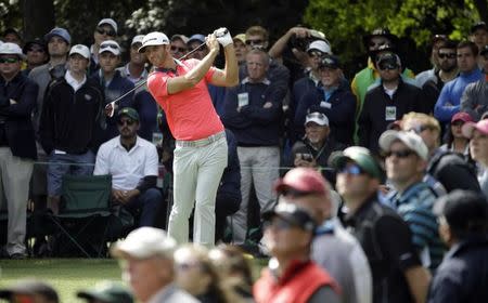 Apr 10, 2016; Augusta, GA, USA; Dustin Johnson hits his tee shot on the 7th hole during the final round of the 2016 The Masters golf tournament at Augusta National Golf Club. Mandatory Credit: Rob Schumacher-USA TODAY Sports