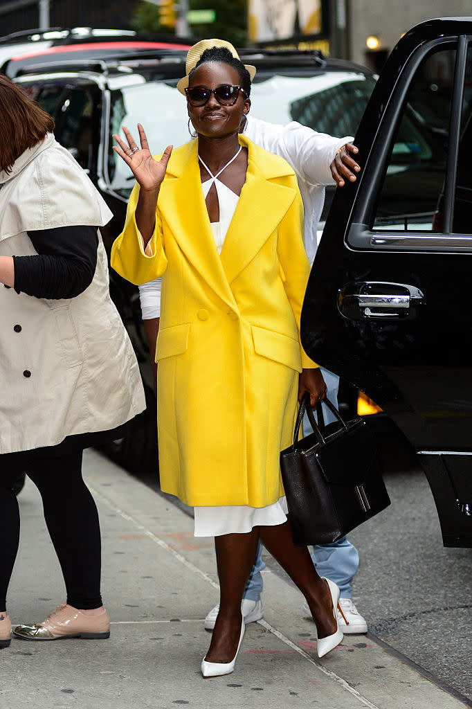 <p>Who says you can’t wear white after Labour Day? Definitely not Lupita Nyong’o, who wore a lovely white dress and white shoes to “The Late Show with Stephen Colbert.” The best part of this outfit, though, has to be the sunny yellow coat. You can always count on Nyong’o to bring some brightness to even the dullest of days. <i>(Photo by Ray Tamarra/GC Images)</i><br></p>