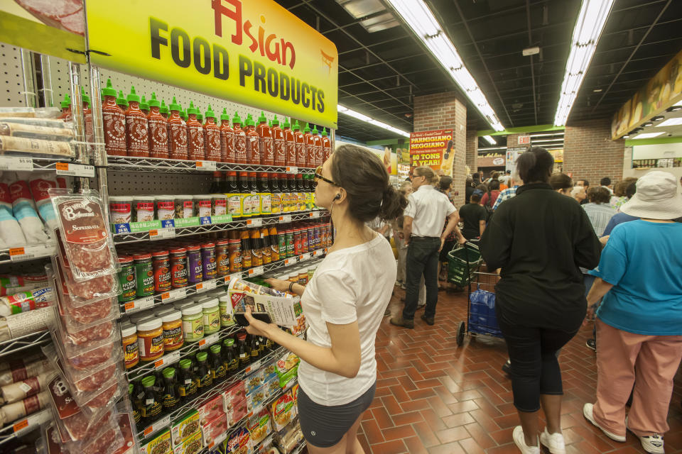 Shoppers at the Fairway supermarket in the Chelsea neighborhood of New York on its grand opening day, Wednesday, July 24, 2013. Fairway supermarkets announced it needs to raise capital in order to meet debt obligations in April. The grocer embarked on an ambitious expansion plan after going public in 2013, now having 15 stores. (�� Richard B. Levine) (Photo by Richard Levine/Corbis via Getty Images)