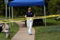 <p>An FBI agent leaves the crime scene on Republic of Texas Boulevard following an explosion in Austin, Texas, March 19, 2018. (Photo: Sergio Flores/Reuters) </p>