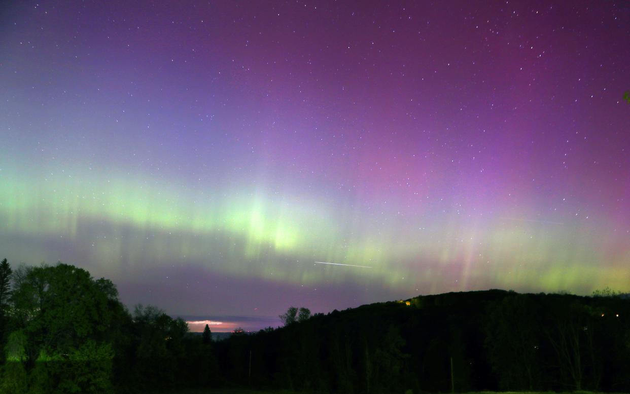 The northern lights as seen from the Stormville Mountain rest stop on Interstate 84 in East Fishkill, NY, early Saturday morning May 11, 2024.