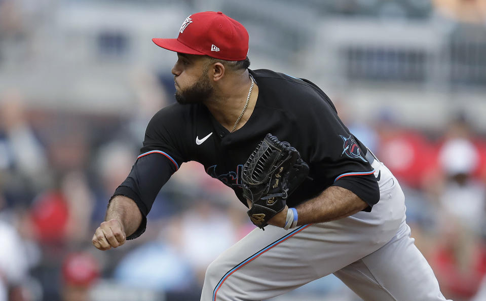 Miami Marlins pitcher Yimi Garcia works against the Atlanta Braves during the ninth inning of a baseball game Saturday, July 3, 2021, in Atlanta. (AP Photo/Ben Margot)