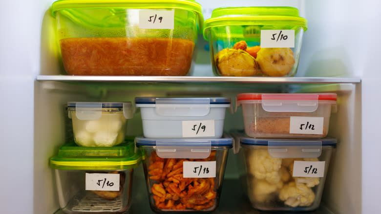 leftover food containers in fridge