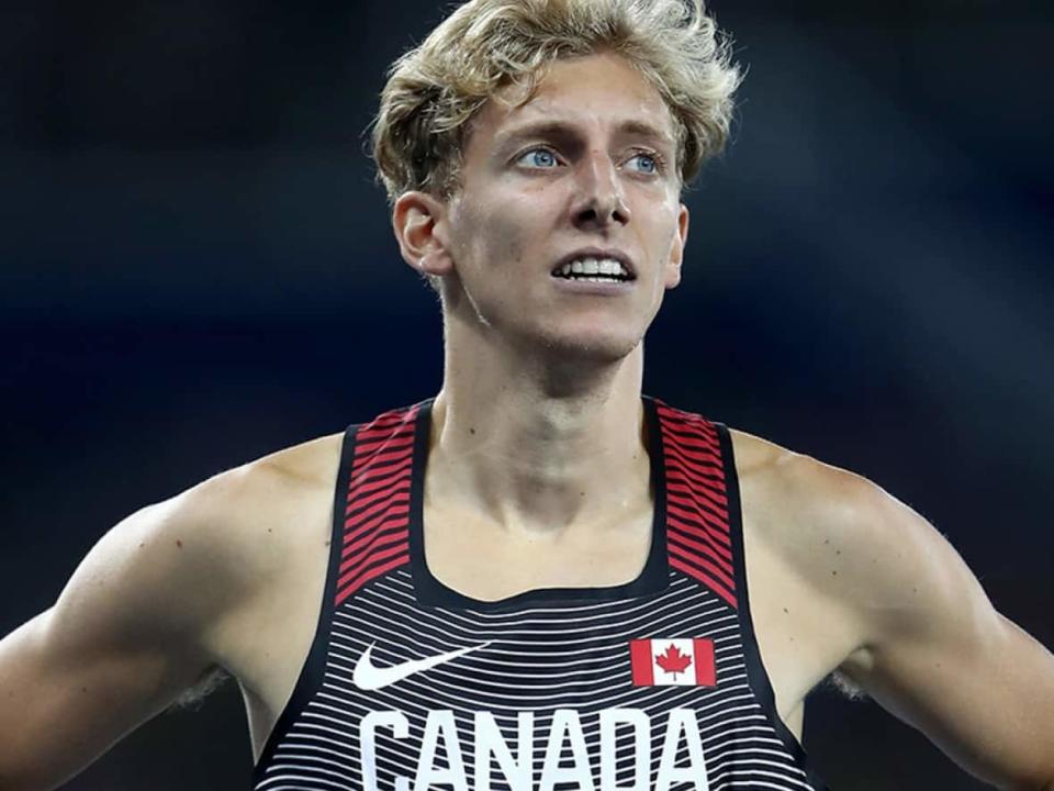 Five 1,500-metre runners are on Athletics Canada's program of financially supported athletes through next September but not Quebec City's Charles Philibert-Thiboutot, pictured. However, he is the only one to have already met the qualifying standard in the event for next year's track and field world championships. (Cameron Spencer/Getty Images/File - image credit)