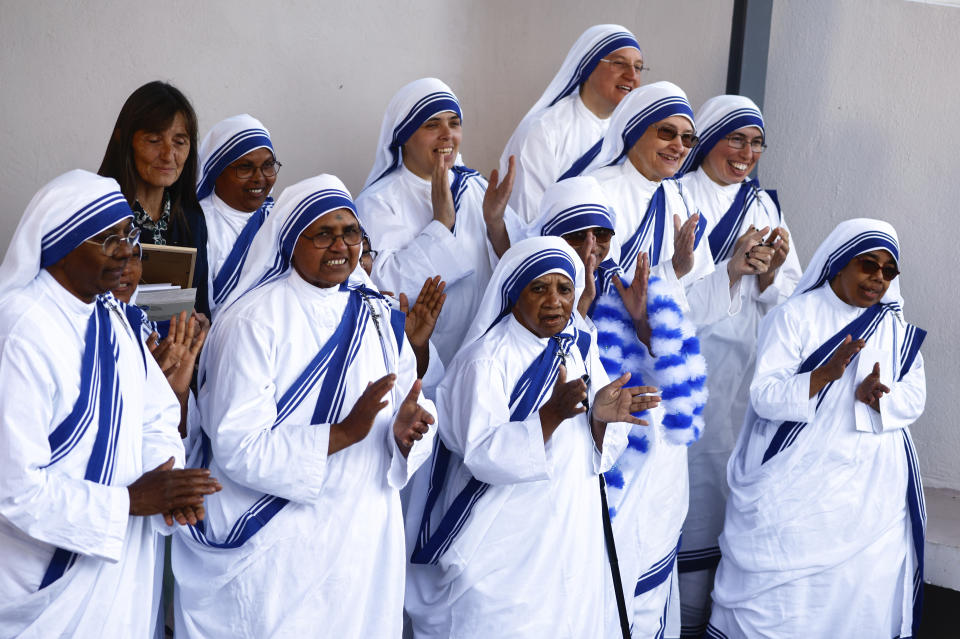 Nuns applaud as Pope Francis arrives for a private meeting with people experiencing economic hardship, at the House of the Missionaries of Charity, in Marseille, France, Saturday, Sept. 23, 2023. Francis, during a two-day visit, will join Catholic bishops from the Mediterranean region on discussions that will largely focus on migration. (Yara Nardi/Reuters via AP, Pool)