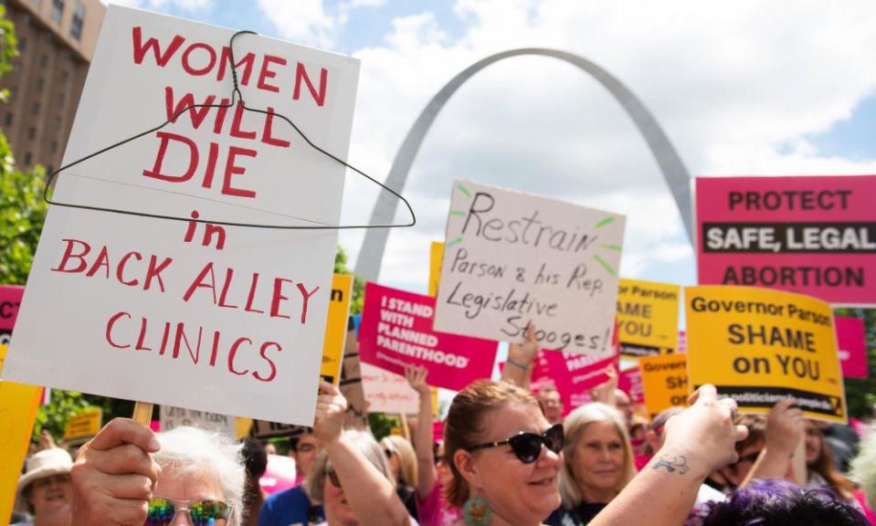 Protesters rally in support of Planned Parenthood in St Louis, Missouri, on 30 May.