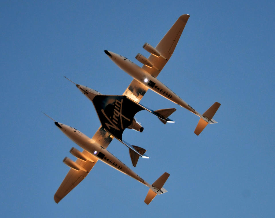 Virgin Galactic’s carrier airplane WhiteKnightTwo carrying space tourism rocket plane SpaceShipTwo takes off from Mojave Air and Space Port in Mojave, California, U.S. December 13, 2018. REUTERS/Gene Blevins     TPX IMAGES OF THE DAY