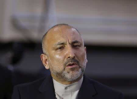 Mohammad Hanif Atmar, former Afghanistan National Security Adviser, speaks to the media after arriving to register as a candidate for the presidential election at Afghanistan's Independent Election Commission (IEC) in Kabul, Afghanistan January 18, 2019. REUTERS/Omar Sobhani