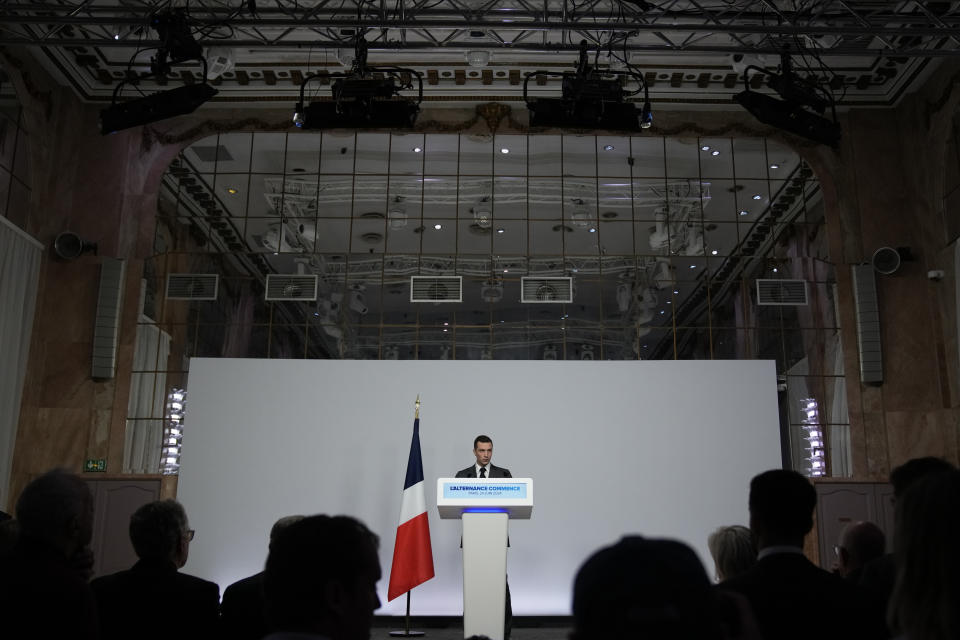 Far-right National Rally party president Jordan Bardella gives a press conference, Monday, June 24, 2024 in Paris. The upcoming two-round parliamentary election will take place on June 30 and July 7. (AP Photo/Christophe Ena)