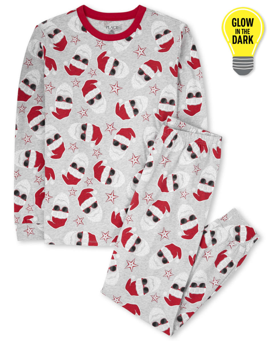 Unisex Adult Matching Family Glow Santa Cotton Pajamas. Image via The Children's Place.