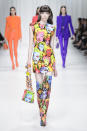 <p><i>Model wears a dress with matching bags and shoes printed with the famous Andy Warhol artwork of Marilyn Monroe from the SS18 Versace collection. This looks is an ode to when Gianni Versace first introduced the Warholian looks in 1993. (Photo: ImaxTree) </i></p>