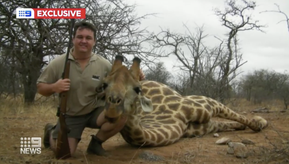 Jewell Crossberg, pictured with a dead giraffe, has been appointed acting district manager of the Western Australian Department of Biodiversity, Conservation and Attractions in Esperance. Source: Nine News