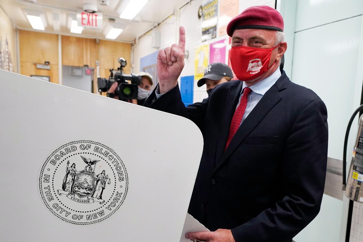 Republican candidate for New York mayor Curtis Sliwa speaks to the media as he votes at Frank McCourt High School, in New York, Tuesday, June 22. 