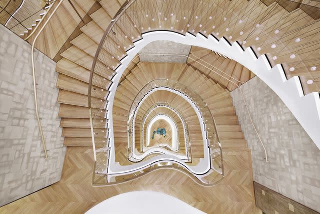 <p>Courtesy of Tiffany & Co.</p> Visitors can take the spiral staircase between floors three and eight.