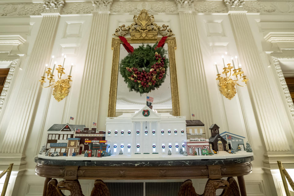 The official Gingerbread White House is displayed in the State Dining Room of the White House during a press preview of the holiday decoration on November 29, 2021 in Washington DC. This year's theme for the White House Christmas decorations is �Gifts from the Heart.� Photo by Ken Cedeno/Sipa USA.