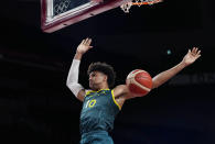 Australia's Matisse Thybulle (10) hangs in the air as he scores against against Italy during a men's basketball preliminary round game at the 2020 Summer Olympics, Wednesday, July 28, 2021, in Saitama, Japan. (AP Photo/Eric Gay)