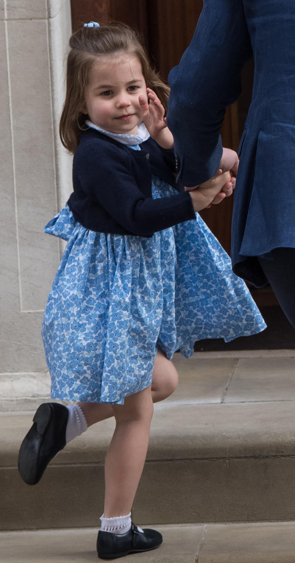 Princess Charlotte stole the show during the royal baby’s birth on Monday by waving sweetly to the crowds. [Photo: Getty]