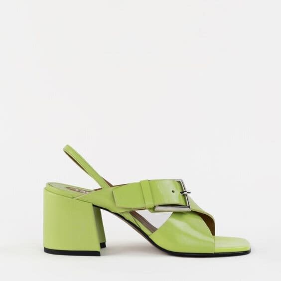 <strong><a href="https://labucq.com/collections/shop-all/products/chan-lime-patent" target="_blank" rel="noopener noreferrer">Get the Labucq Chan sandals in lime patent leather for $355.</a></strong>