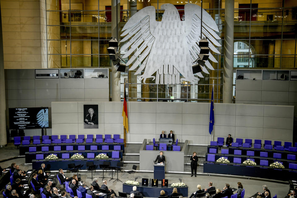 French President Emmanuel Macron delivers a speech during a state ceremony to commemorate late former German finance minister Wolfgang Schaeuble in the German parliament in Berlin, Germany, Monday, Nov.22, 2024. (AP Photo/Markus Schreiber)