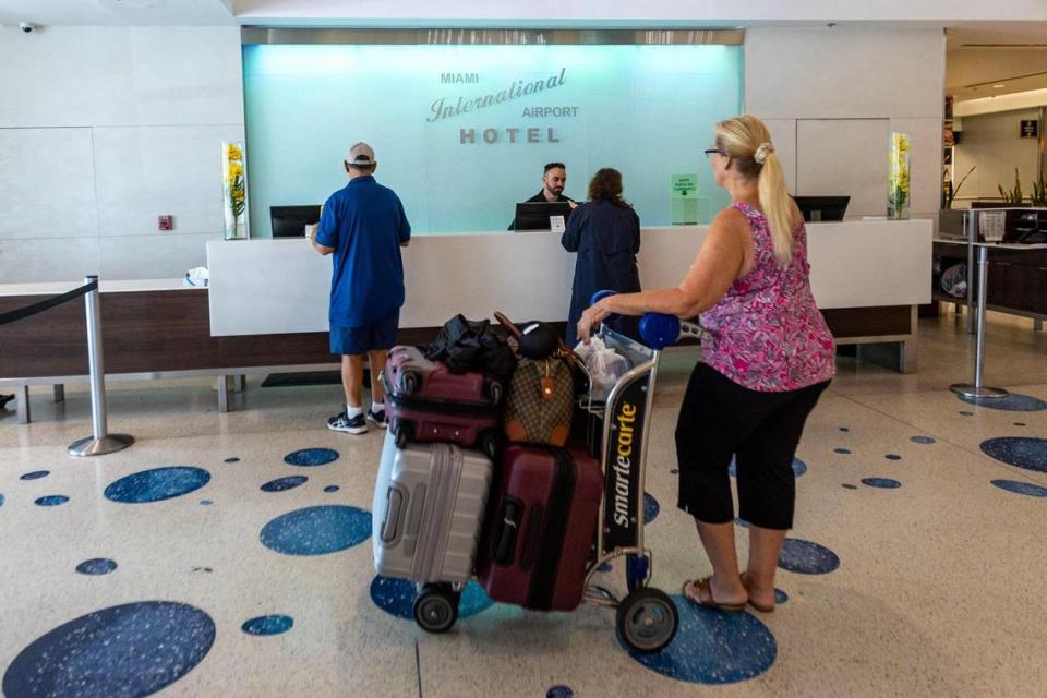 Guests wait for service inside the lobby of Miami International Airport Hotel at MIA on Friday, June 30, 2023.