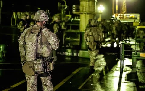 British Royal Marines taking part in the seizure of an Iranian oil tanker, Grace 1 in the early hours of July 4, 2019 off the Gibraltar strait.  - Credit: AFP