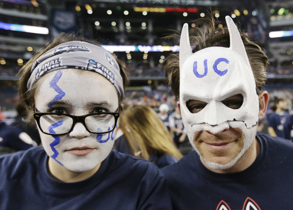 Connecticut fans show their support befer an NCAA Final Four tournament college basketball semifinal game against Florida Saturday, April 5, 2014, in Dallas. (AP Photo/Eric Gay)