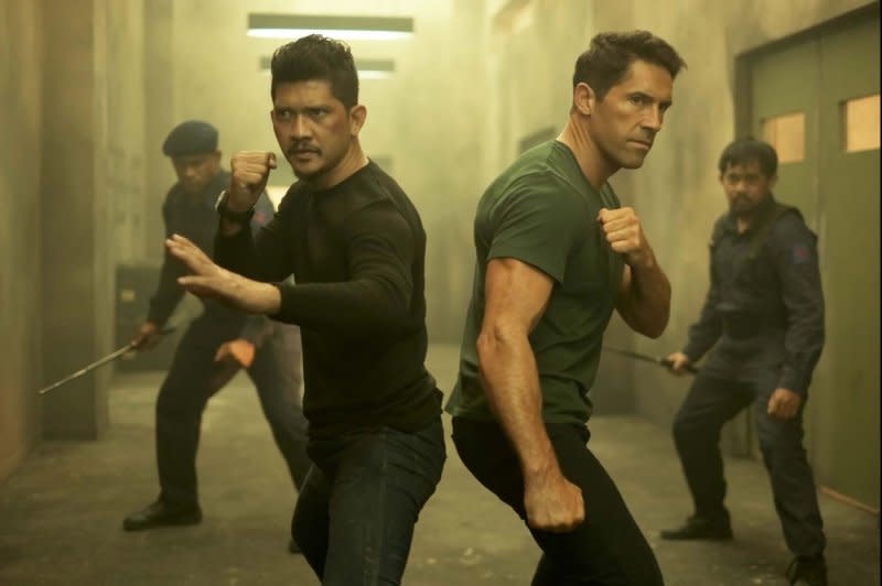 Iko Uwais (front L) and Scott Adkins (front R) star in "Skyline: Warpath." Photo courtesy of XYZ Films