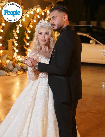 <p>Anas Abu Jaber</p> Tigerlily and Adnan Abdelfattah hold hands at their September 2023 wedding