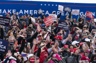 Supporters cheer as President Donald Trump arrives to speak at a campaign rally at Manchester-Boston Regional Airport, Sunday, Oct. 25, 2020, in Londonderry, N.H. (AP Photo/Alex Brandon)