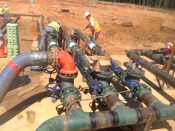 Macon-based AH&amp;P Consulting Engineers pioneered geothermal technology at two Georgia military bases that cut energy costs in half. Here, they are installing boreholes for cold water storage.