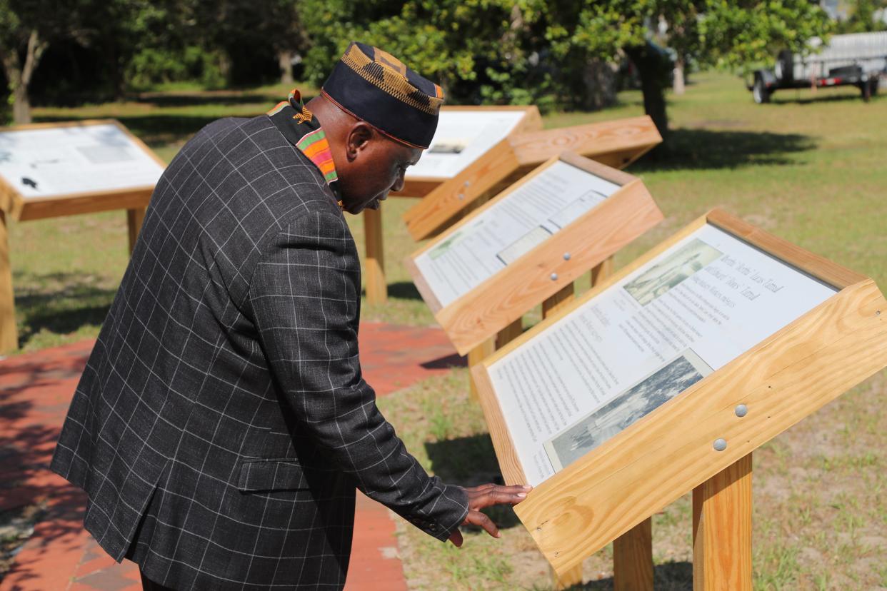 Bishop Willie Ferrell looks at the new Tybee Black History Trail panels during the official dedication ceremony for the Tybee Island Black History Trail on Tuesday, May 7, 2024.
