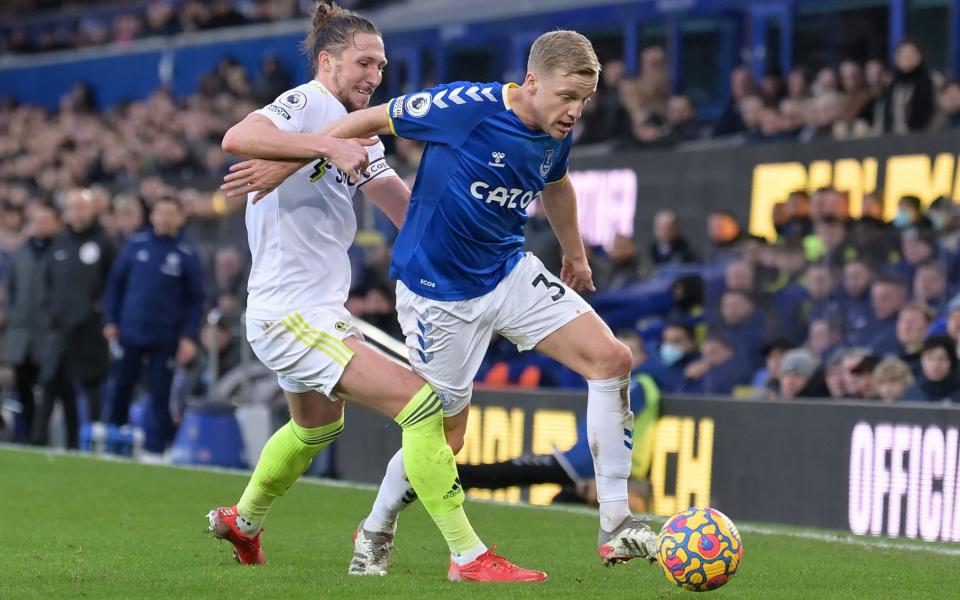 Donny van de Beek and Luke Ayling battle for the ball