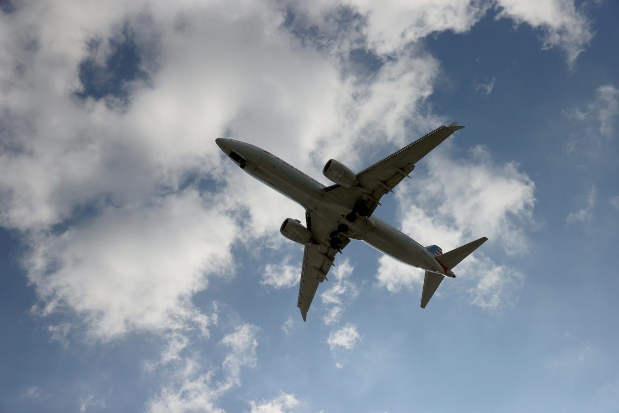 An American Airlines Boeing 787-9 Dreamliner approaches for a landing at the Miami International Airport on December 10, 2021.