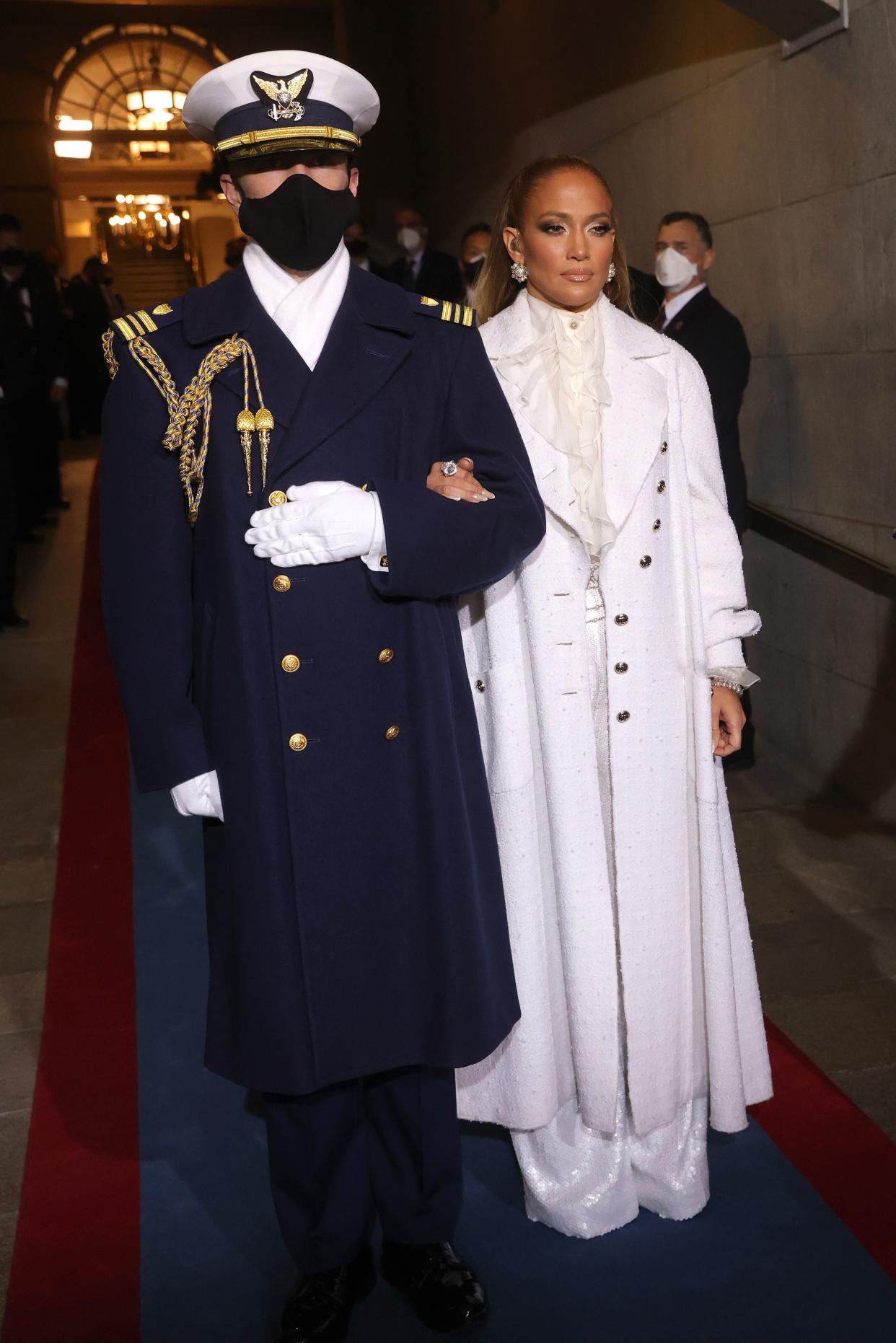 Jennifer Lopez is escorted to the inauguration of U.S. President-elect Joe Biden on the West Front of the U.S. Capitol on Jan. 20, 2021, in Washington, DC.