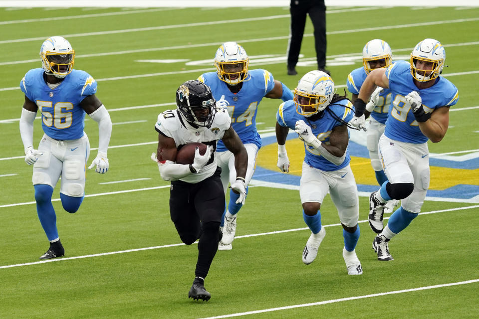 Jacksonville Jaguars running back James Robinson runs against the Los Angeles Chargers during the first half of an NFL football game Sunday, Oct. 25, 2020, in Inglewood, Calif. (AP Photo/Alex Gallardo)