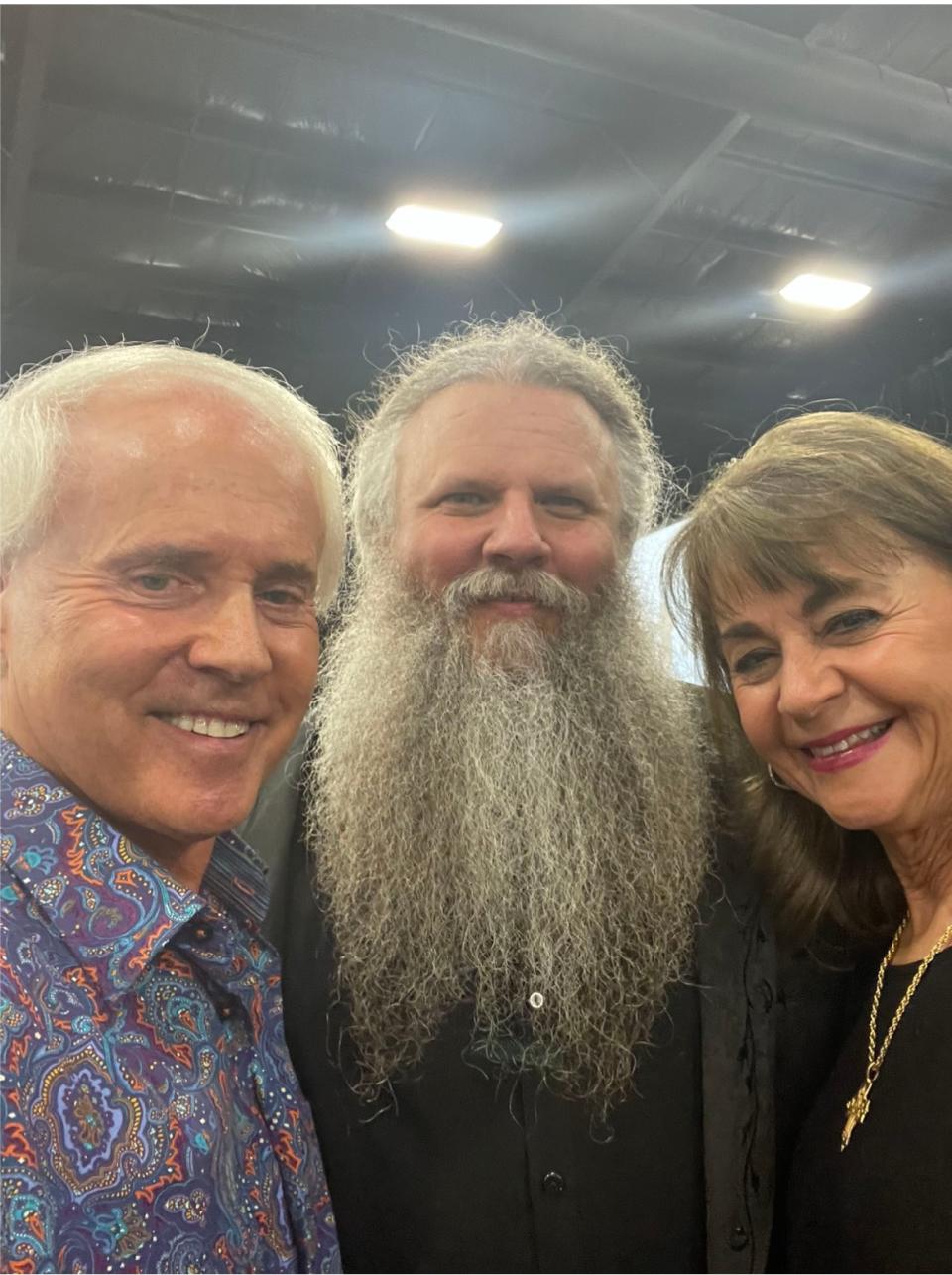 Perry and Judy Hooper with Jamey Johnson, center, at the Grand Ole Opry.