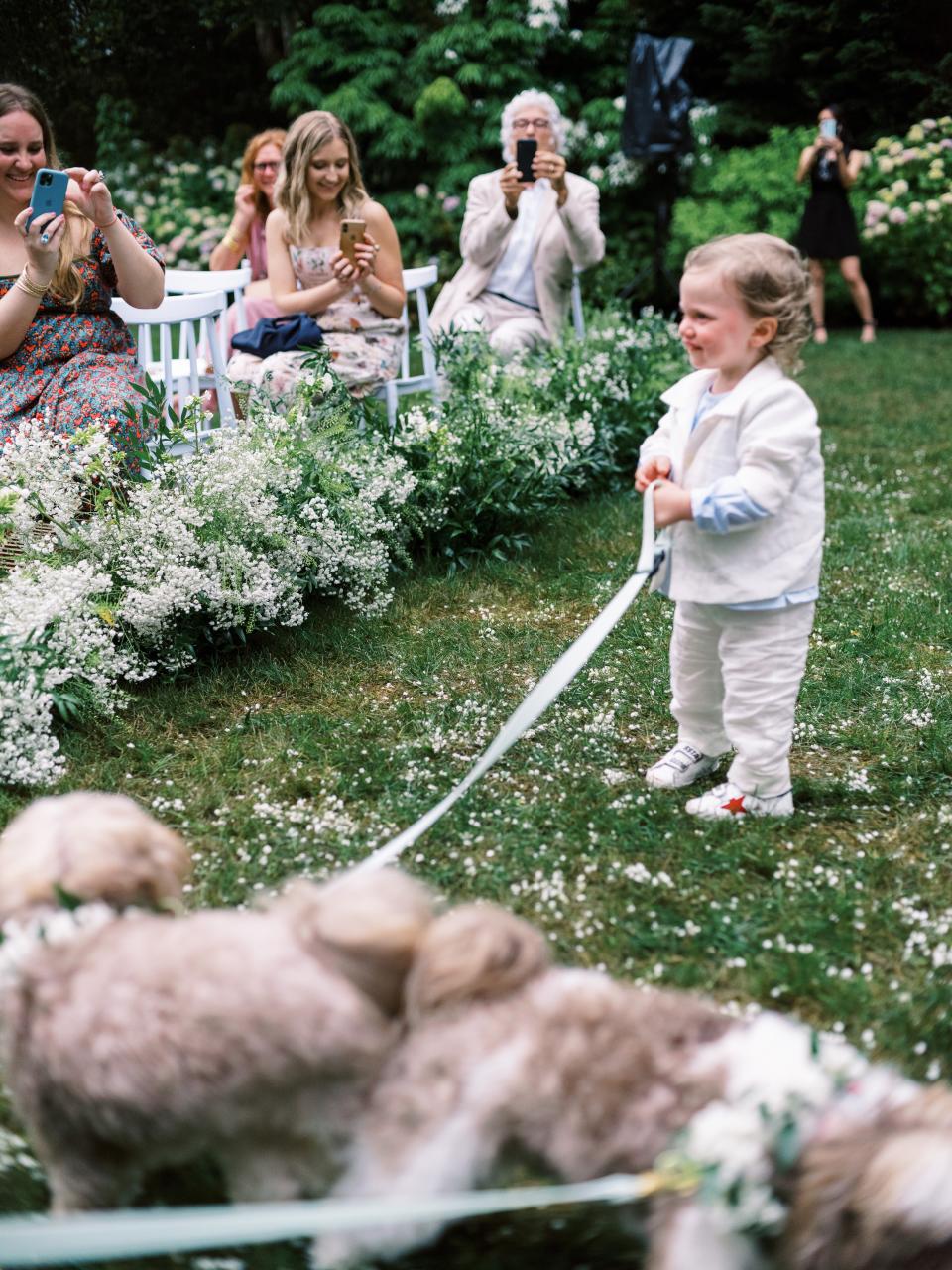 The Bride and Groom Said Their Vows Beneath a Floral Chuppah at This Hamptons Backyard Wedding