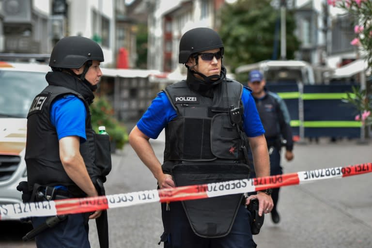 Policemen on duty behind a cordon in Schaffhausen, northern Switzerland, on July 24, 2017