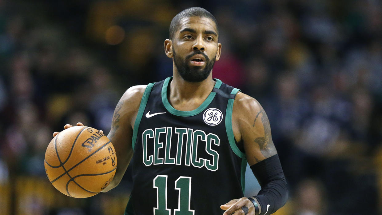 Boston Celtics' Kyrie Irving plays against the Orlando Magic during the first quarter of an NBA basketball game in BostonMagic Celtics Basketball, Boston, USA - 21 Jan 2018.