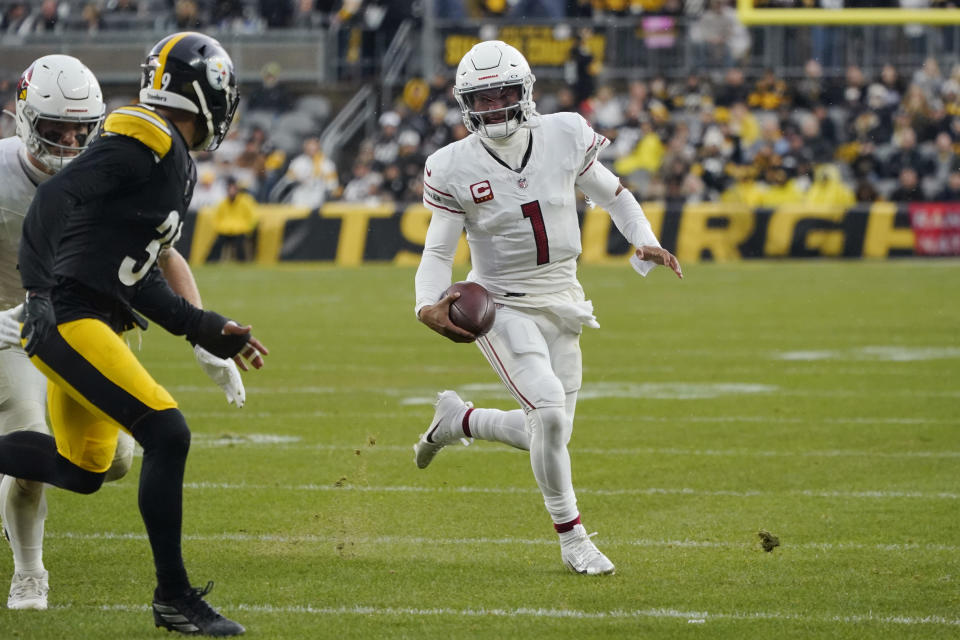 Arizona Cardinals quarterback Kyler Murray (1) runs with the ball as he tries to get past Pittsburgh Steelers safety Minkah Fitzpatrick (39) during the second half of an NFL football game Sunday, Dec. 3, 2023, in Pittsburgh. (AP Photo/Gene J. Puskar)