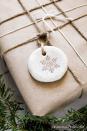 <p>You can either use a stamp to put a snowflake shape on a salt dough circle, or you can use a cookie cutter to make salt dough in the shape of a snowflake. Either way, you have an ornament, a gift topper or other Christmas keepsake.</p><p><a href="https://domesticallyblissful.com/christmas-salt-dough-gift-ornaments/" rel="nofollow noopener" target="_blank" data-ylk="slk:Get the tutorial at Domestically Blissful »;elm:context_link;itc:0;sec:content-canvas" class="link "><em>Get the tutorial at Domestically Blissful »</em></a></p>