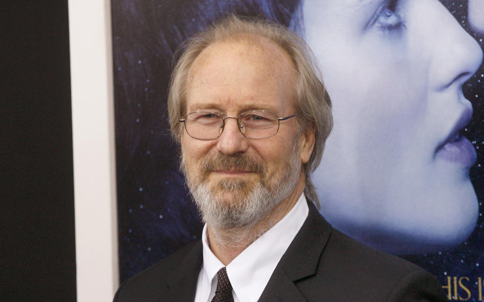 William smiles for a photo on the red carpet