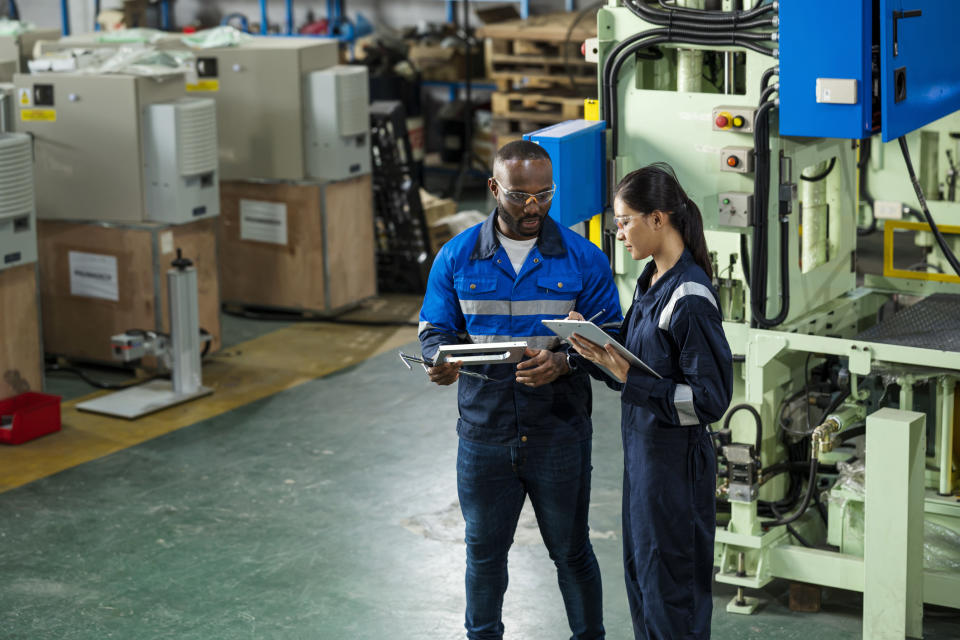 factory workers talking