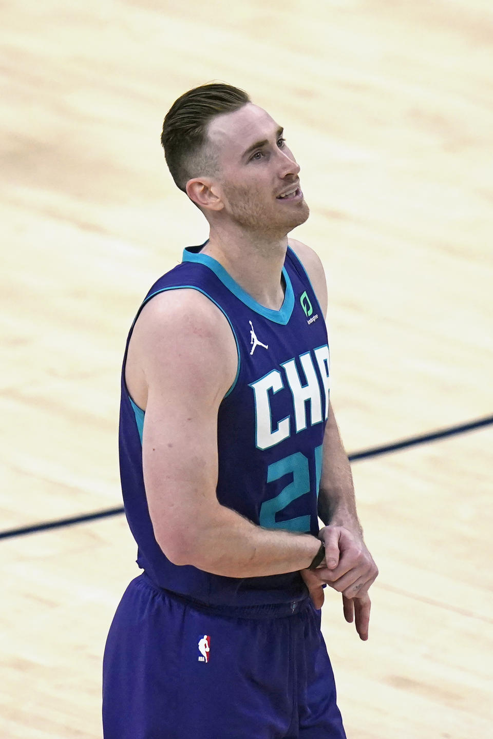 Charlotte Hornets forward Gordon Hayward (20) walks off the court after injuring his right wrist in the second half during an NBA basketball game against the Utah Jazz Monday, Feb. 22, 2021, in Salt Lake City. (AP Photo/Rick Bowmer)