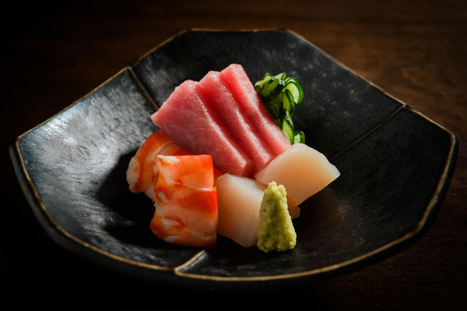 <div class="cell medium-auto caption">Chef Hiro’s take on artisan Edo-style sushi</div> <div class="cell medium-shrink medium-text-right credit">Q Sushi</div>