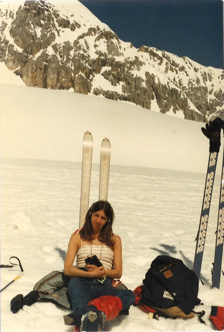 Mom relaxing on ski slopes