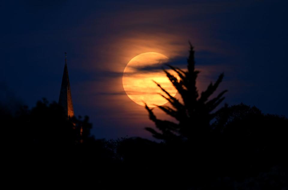 the final supermoon of the year rises over europe