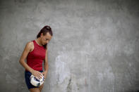 Soccer player Mara Gomez poses for a portrait at her home in La Plata, Argentina, Thursday, Feb. 6, 2020. Gomez is a transgender woman who is limited to only training with her women's professional soccer team, Villa San Carlos, while she waits for permission to start playing from the Argentina Football Association (AFA). If approved, she would become the first trans woman to compete in a first division, professional Argentine AFA tournament. (AP Photo/Natacha Pisarenko)