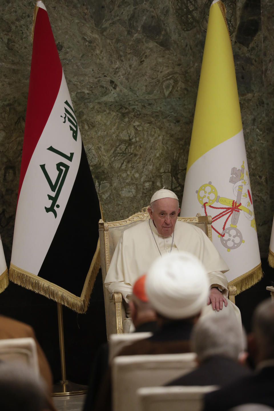 Pope Francis meets authorities and civil society at Baghdad's Presidential Palace, Iraq, Friday, March 5, 2021. Pope Francis has arrived in Iraq to urge the country's dwindling number of Christians to stay put and help rebuild the country after years of war and persecution, brushing aside the coronavirus pandemic and security concerns. (AP Photo/Andrew Medichini)