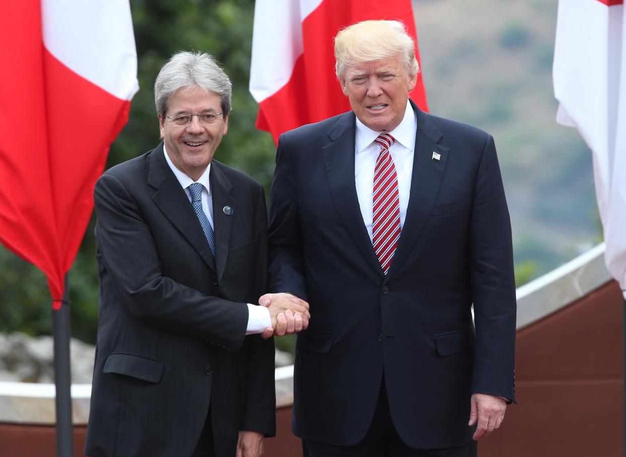 Italian Prime Minister Paolo Gentiloni shakes hands with with US President Donald Trump at the G7 Taormina summit: Sean Gallup/Getty Images